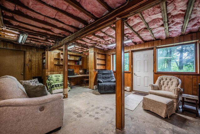 98 Torrington Ave, Canton, CT 06019 - below grade area with wooden walls, a baseboard radiator, and an office area
