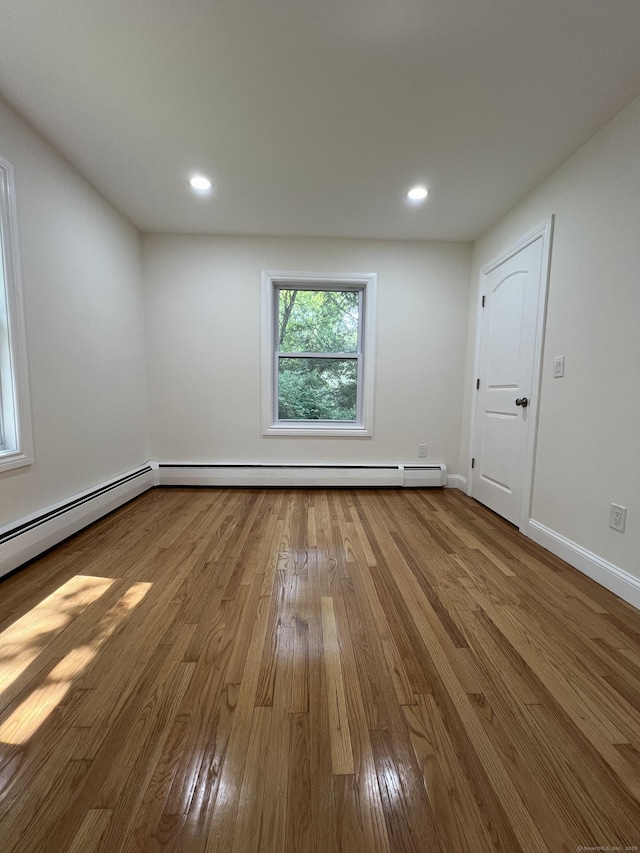 52 Sylvan St, Avon, CT 06001 - empty room featuring hardwood / wood-style floors and recessed lighting