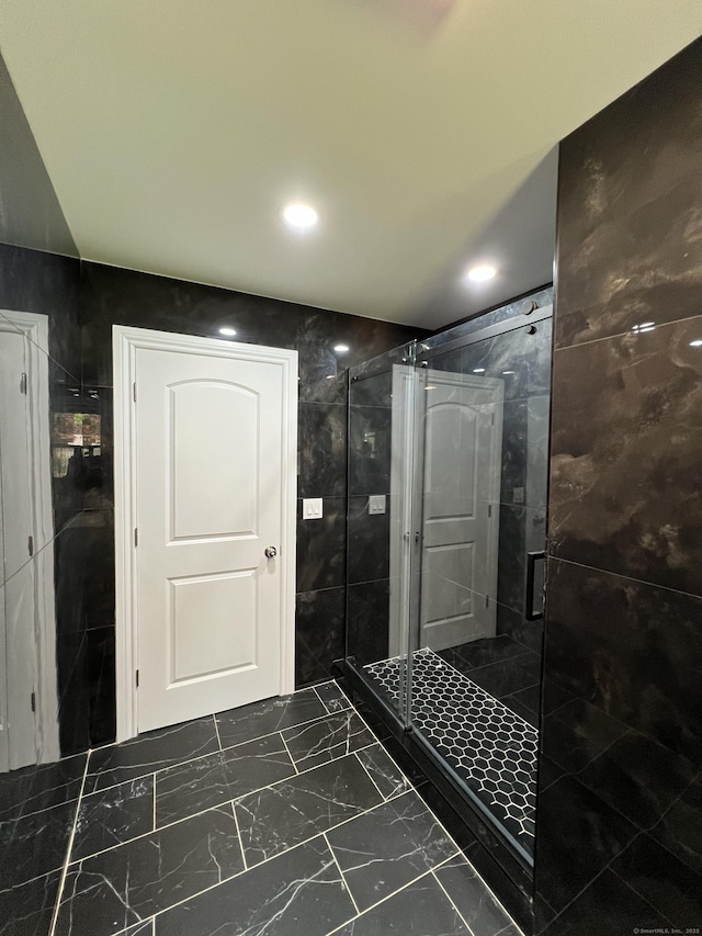 52 Sylvan St, Avon, CT 06001 - full bathroom featuring a stall shower, marble look tiles, and recessed lighting