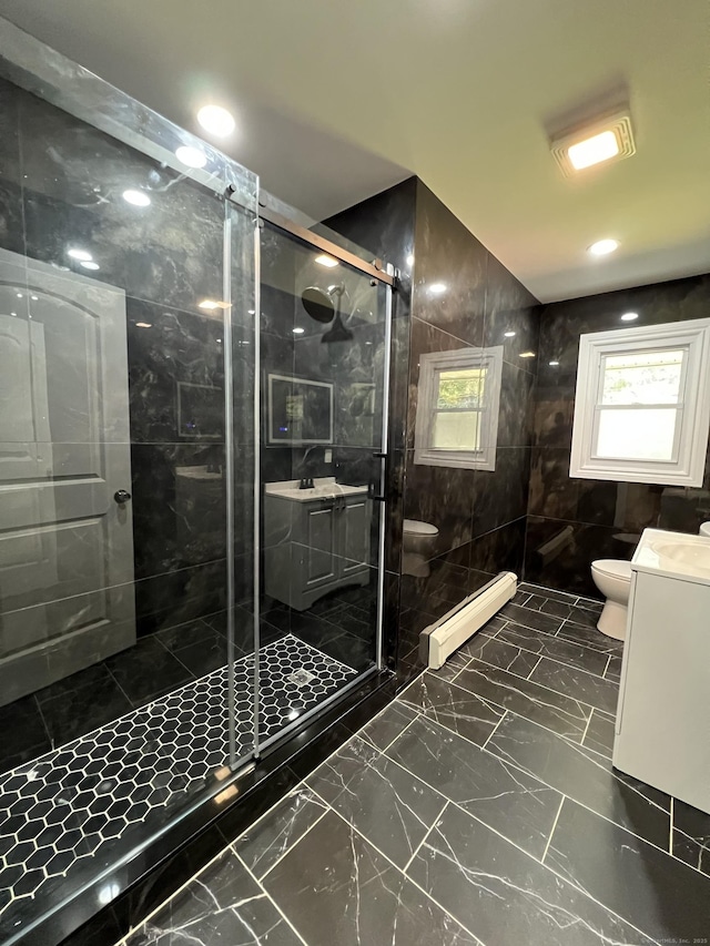52 Sylvan St, Avon, CT 06001 - full bath featuring vanity, a baseboard heating unit, healthy amount of natural light, and a stall shower