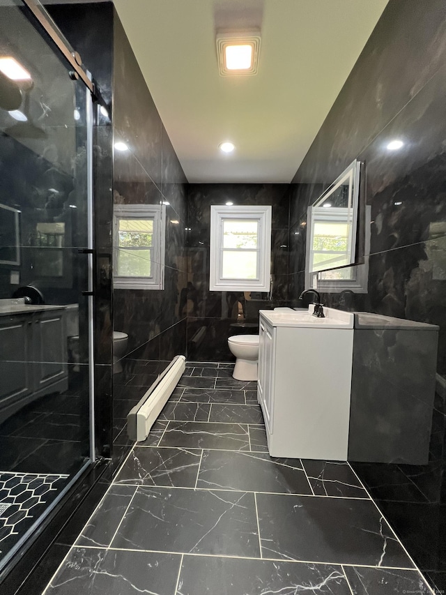 52 Sylvan St, Avon, CT 06001 - full bathroom featuring a stall shower, vanity, marble finish floors, tile walls, and a baseboard radiator