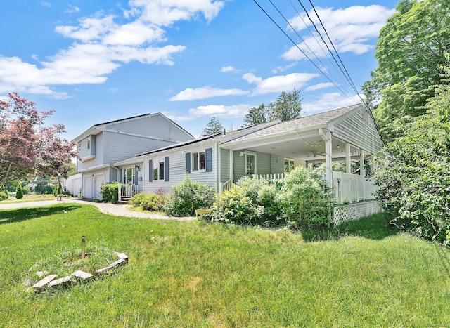 97 Benedict Dr, South Windsor, CT 06074 - back of property featuring ceiling fan and an attached garage