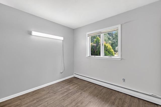 97 Benedict Dr, South Windsor, CT 06074 - empty room featuring a baseboard radiator and wood finished floors