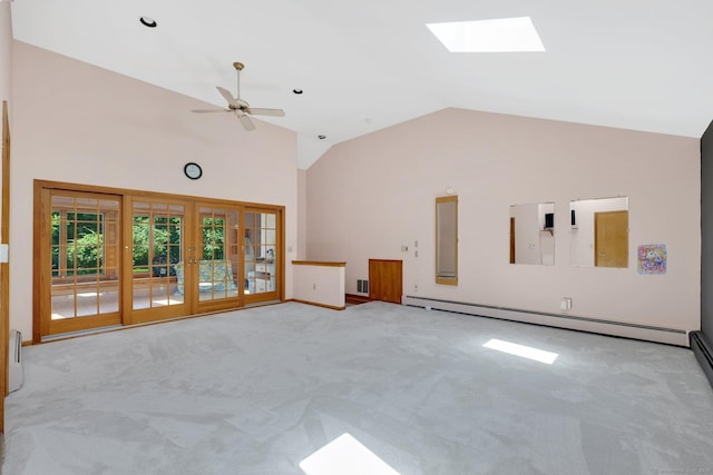 97 Benedict Dr, South Windsor, CT 06074 - unfurnished living room featuring a skylight, baseboard heating, carpet floors, ceiling fan, and french doors