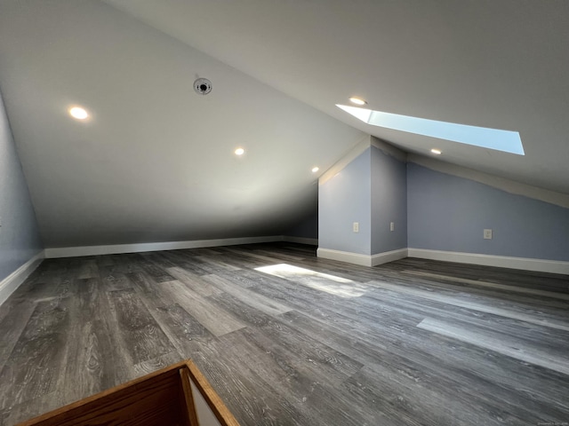 372 Oakland St, Manchester, CT 06042 - additional living space with a skylight, vaulted ceiling, dark wood-style flooring, and recessed lighting