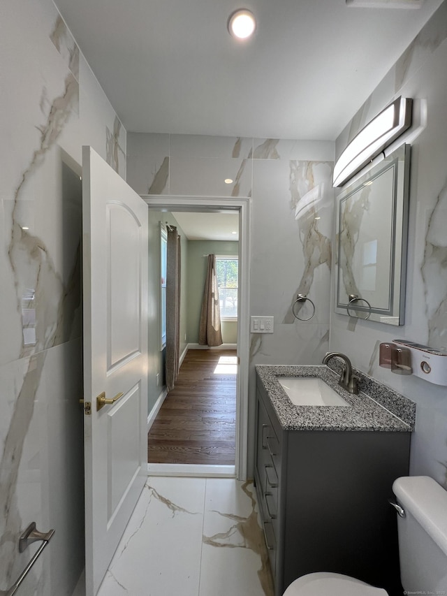 372 Oakland St, Manchester, CT 06042 - bathroom featuring marble finish floors and vanity