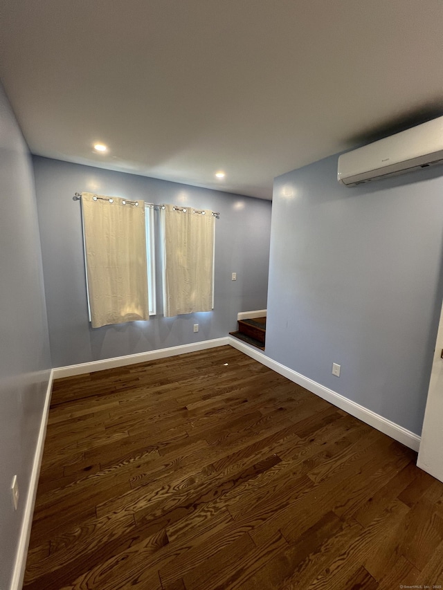 372 Oakland St, Manchester, CT 06042 - spare room with a wall mounted air conditioner, wood finished floors, and recessed lighting