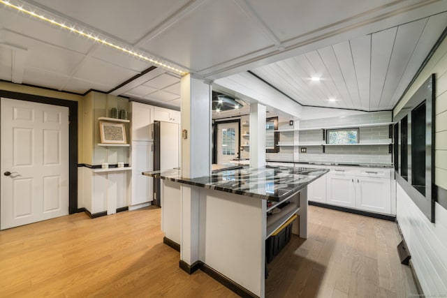 486 Barlow St, Bristol, CT 06010 - kitchen with open shelves, light wood-style flooring, white cabinets, a kitchen island, and recessed lighting