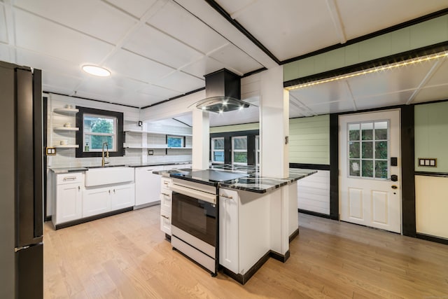 486 Barlow St, Bristol, CT 06010 - kitchen with electric range, freestanding refrigerator, island range hood, white dishwasher, and white cabinetry