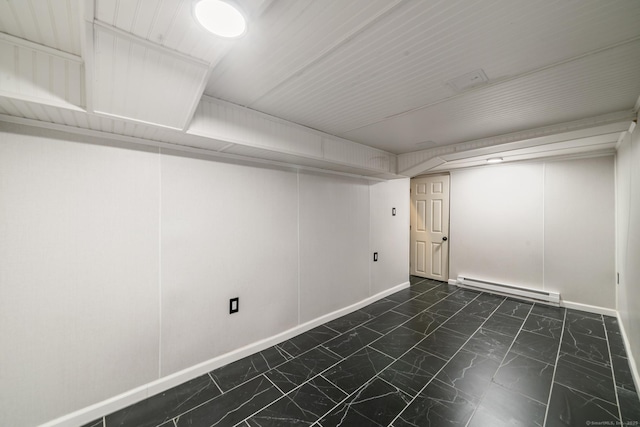 486 Barlow St, Bristol, CT 06010 - finished below grade area with a baseboard heating unit and marble look tile flooring
