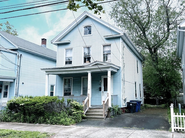 26 Lamberton St, New Haven, CT 06519 - view of front of property featuring a porch and asphalt driveway