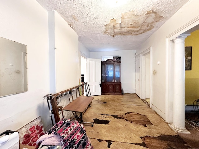 26 Lamberton St, New Haven, CT 06519 - entrance foyer with a textured ceiling and ornate columns