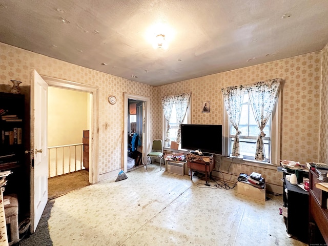 26 Lamberton St, New Haven, CT 06519 - living room with wallpapered walls and plenty of natural light