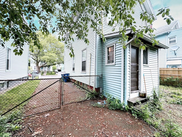 26 Lamberton St, New Haven, CT 06519 - view of side of property featuring a gate