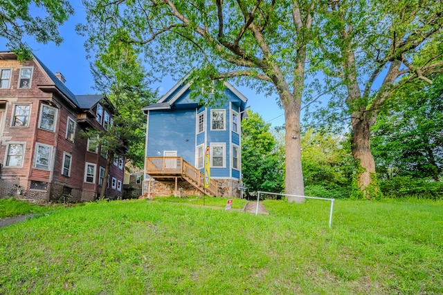 156 Waterville St, Waterbury, CT 06710 - back of house featuring a wooden deck, a yard, and stairs
