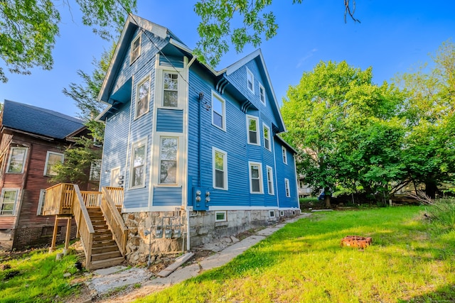 156 Waterville St, Waterbury, CT 06710 - back of property featuring stairway, a yard, and a wooden deck