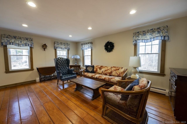 127 Skunk Misery Rd, Haddam, CT 06441 - living room with a baseboard radiator, wood-type flooring, and recessed lighting