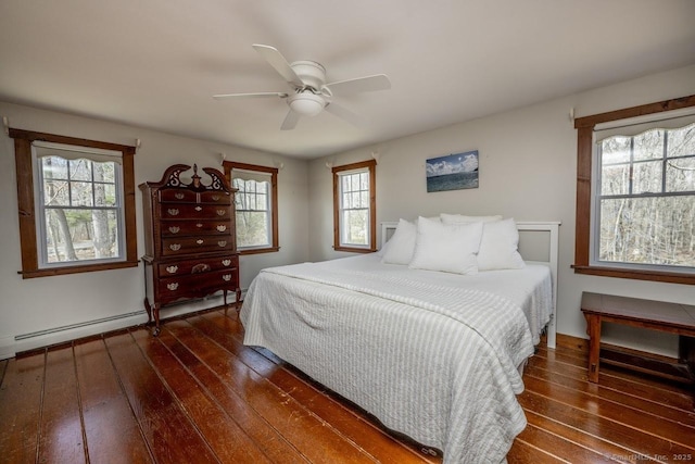 127 Skunk Misery Rd, Haddam, CT 06441 - bedroom with hardwood / wood-style floors, a ceiling fan, and baseboard heating