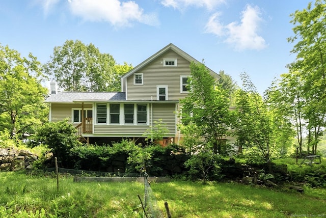 971 New Litchfield St, Torrington, CT 06790 - back of house featuring a chimney