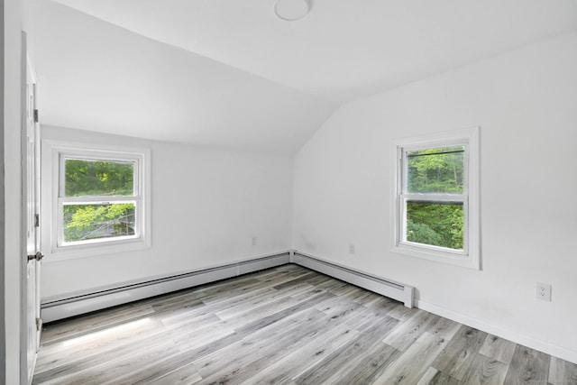 971 New Litchfield St, Torrington, CT 06790 - bonus room with vaulted ceiling, plenty of natural light, light wood-type flooring, and a baseboard radiator