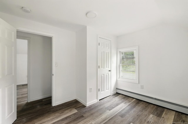 971 New Litchfield St, Torrington, CT 06790 - unfurnished bedroom featuring a baseboard radiator and wood finished floors