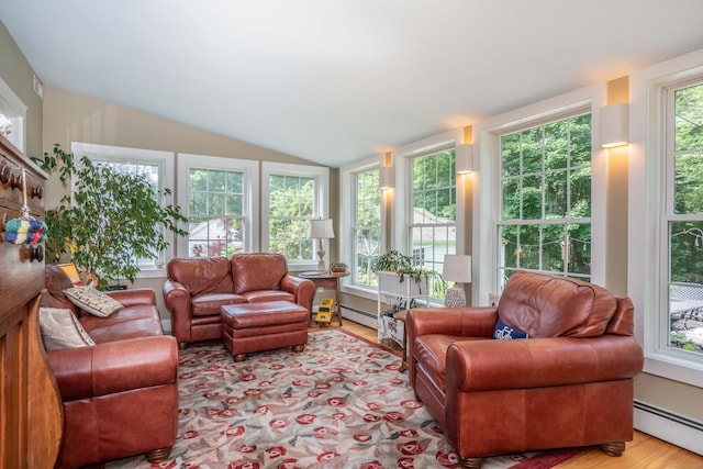 251 Ridgewood Rd, West Hartford, CT 06107 - living area with a baseboard radiator, vaulted ceiling, and wood finished floors