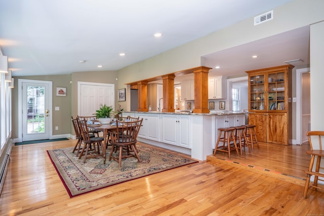 251 Ridgewood Rd, West Hartford, CT 06107 - dining space with light wood-type flooring, recessed lighting, and vaulted ceiling