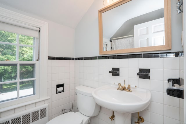 251 Ridgewood Rd, West Hartford, CT 06107 - full bath featuring radiator heating unit, lofted ceiling, and tile walls