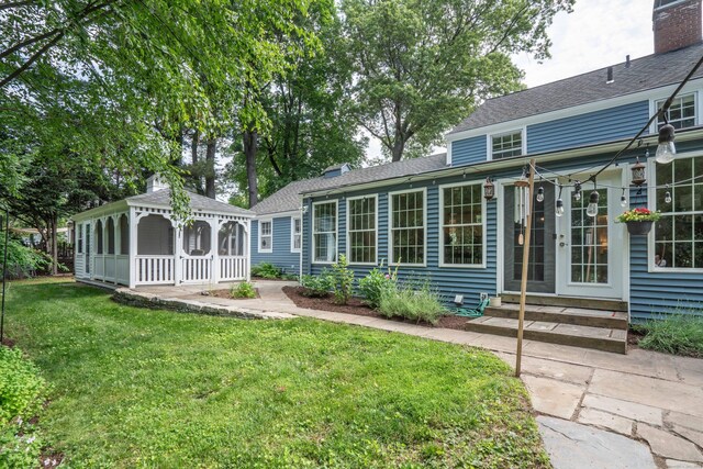 251 Ridgewood Rd, West Hartford, CT 06107 - rear view of house with a gazebo, a yard, and entry steps
