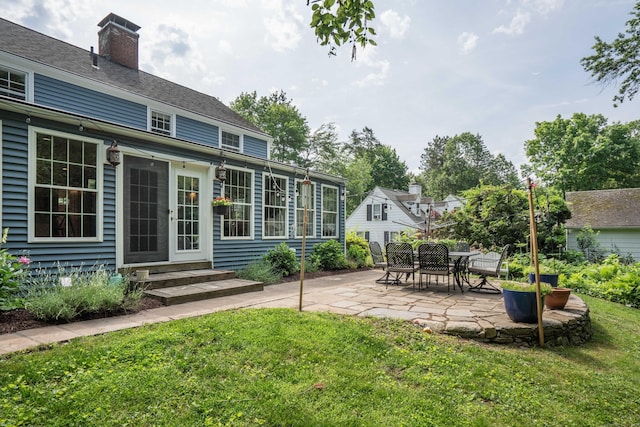251 Ridgewood Rd, West Hartford, CT 06107 - view of grassy yard featuring entry steps and a patio area