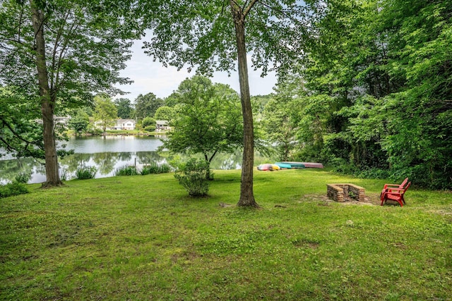 251 Ridgewood Rd, West Hartford, CT 06107 - view of grassy yard with a water view and a fire pit