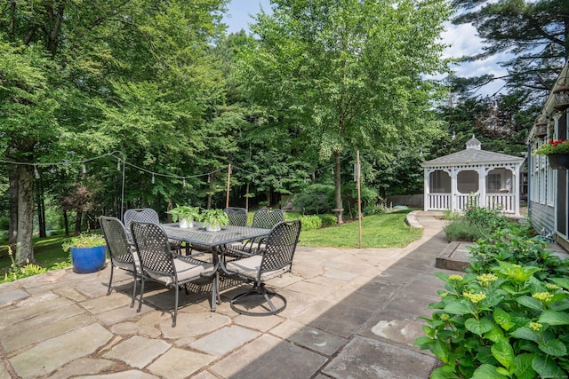 251 Ridgewood Rd, West Hartford, CT 06107 - view of patio / terrace with a gazebo, outdoor dining space, and view of scattered trees