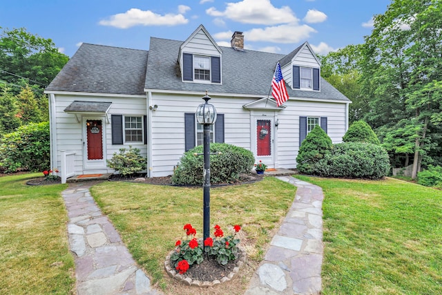 3 Wheeler Dr, Trumbull, CT 06611 - cape cod home with a front yard, a chimney, and roof with shingles