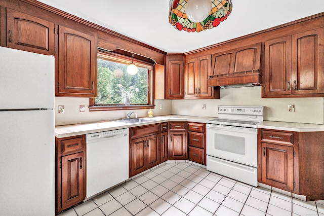 3 Wheeler Dr, Trumbull, CT 06611 - kitchen featuring white appliances, light countertops, light tile patterned floors, and brown cabinetry