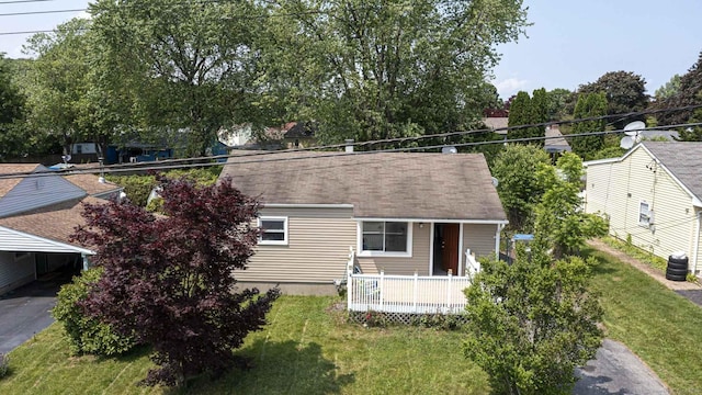 47 Manwaring Rd, Norwich, CT 06360 - view of front of home featuring a front lawn and a carport