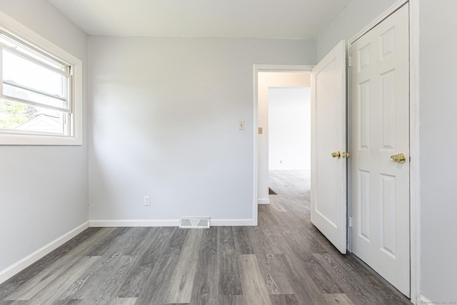 47 Manwaring Rd, Norwich, CT 06360 - spare room with dark wood-style flooring