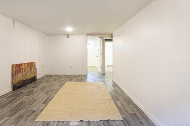 47 Manwaring Rd, Norwich, CT 06360 - finished below grade area with dark wood finished floors and baseboards