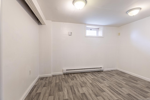 47 Manwaring Rd, Norwich, CT 06360 - below grade area featuring baseboard heating and wood finished floors