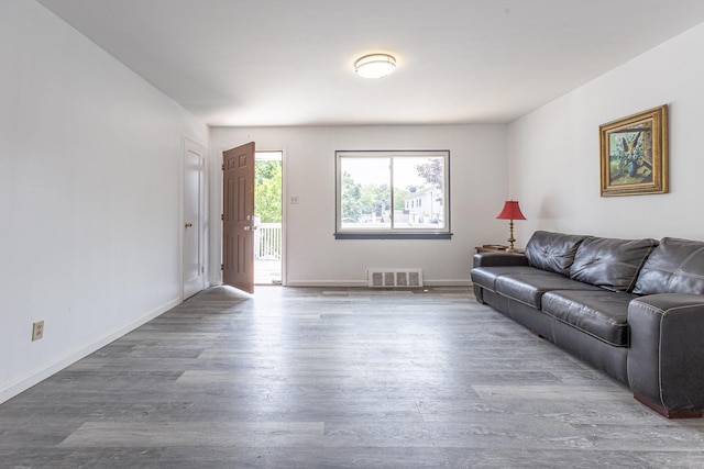 47 Manwaring Rd, Norwich, CT 06360 - living room featuring wood finished floors and baseboards