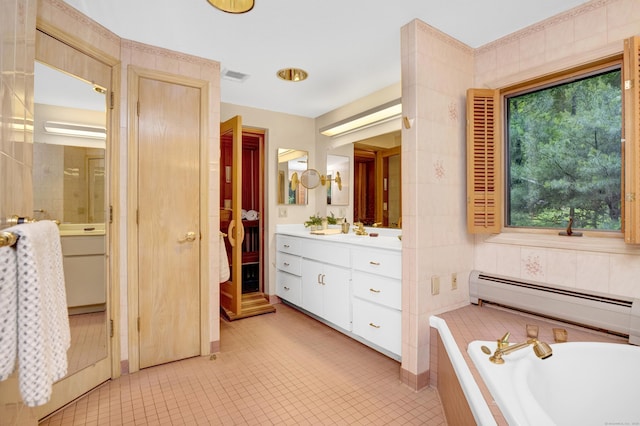 116 Bellridge Rd, Glastonbury, CT 06033 - bathroom featuring vanity, baseboard heating, a bath, and tile patterned floors