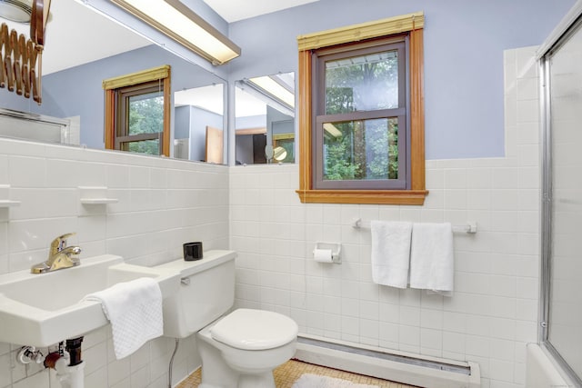 116 Bellridge Rd, Glastonbury, CT 06033 - bathroom featuring baseboard heating, tile walls, and tile patterned floors