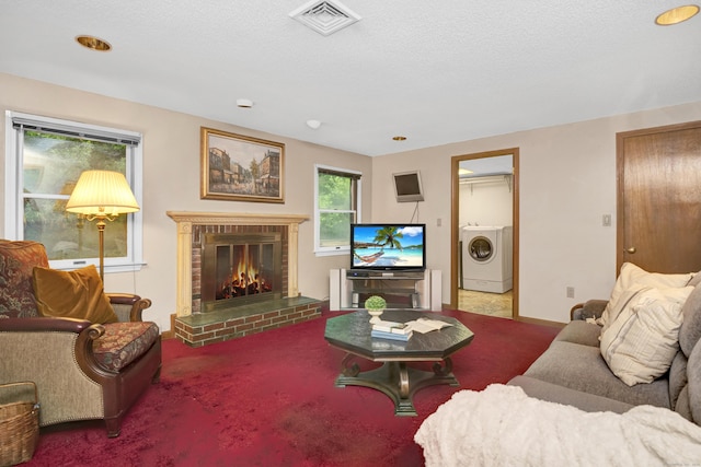 116 Bellridge Rd, Glastonbury, CT 06033 - living area with washer / clothes dryer, a fireplace, and carpet flooring