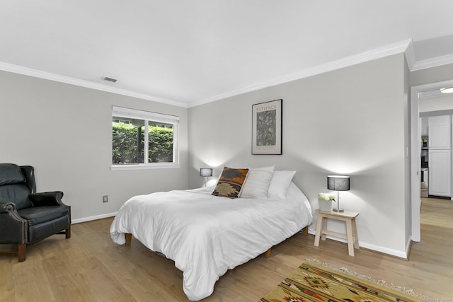 116 Southport Woods Dr, Fairfield, CT 06890 - bedroom featuring ornamental molding and wood finished floors