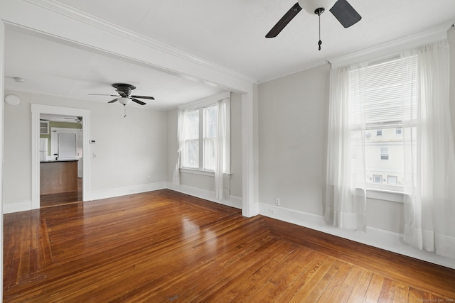 20 George St, Bristol, CT 06010 - spare room with a ceiling fan, wood-type flooring, and ornamental molding
