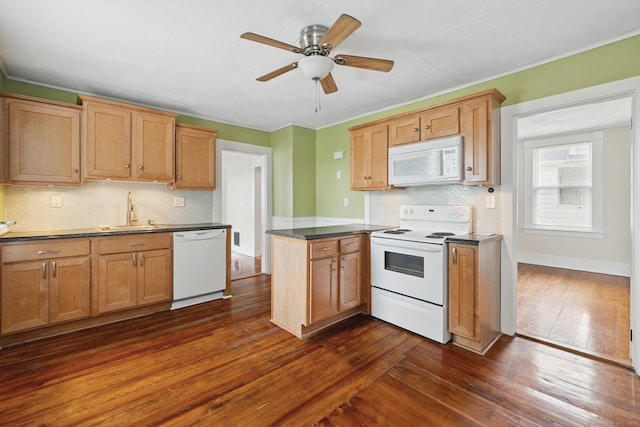 20 George St, Bristol, CT 06010 - kitchen with white appliances, backsplash, dark countertops, dark wood-style floors, and crown molding