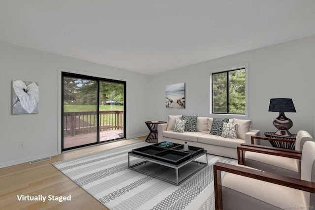 25 Florence Rd Unit 84, Branford, CT 06405 - living area featuring light wood-style flooring and baseboards