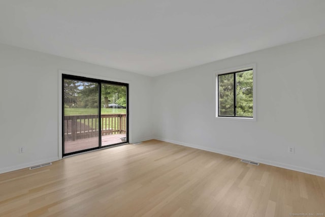 25 Florence Rd Unit 84, Branford, CT 06405 - spare room with light wood-style flooring and baseboards