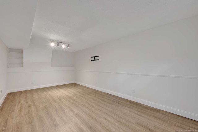 25 Florence Rd Unit 84, Branford, CT 06405 - unfurnished room with light wood-type flooring and track lighting