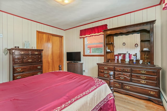 97 Travis Dr, Bridgeport, CT 06606 - bedroom featuring wood finished floors, crown molding, and wood walls