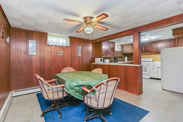 97 Travis Dr, Bridgeport, CT 06606 - dining space with wooden walls and ceiling fan